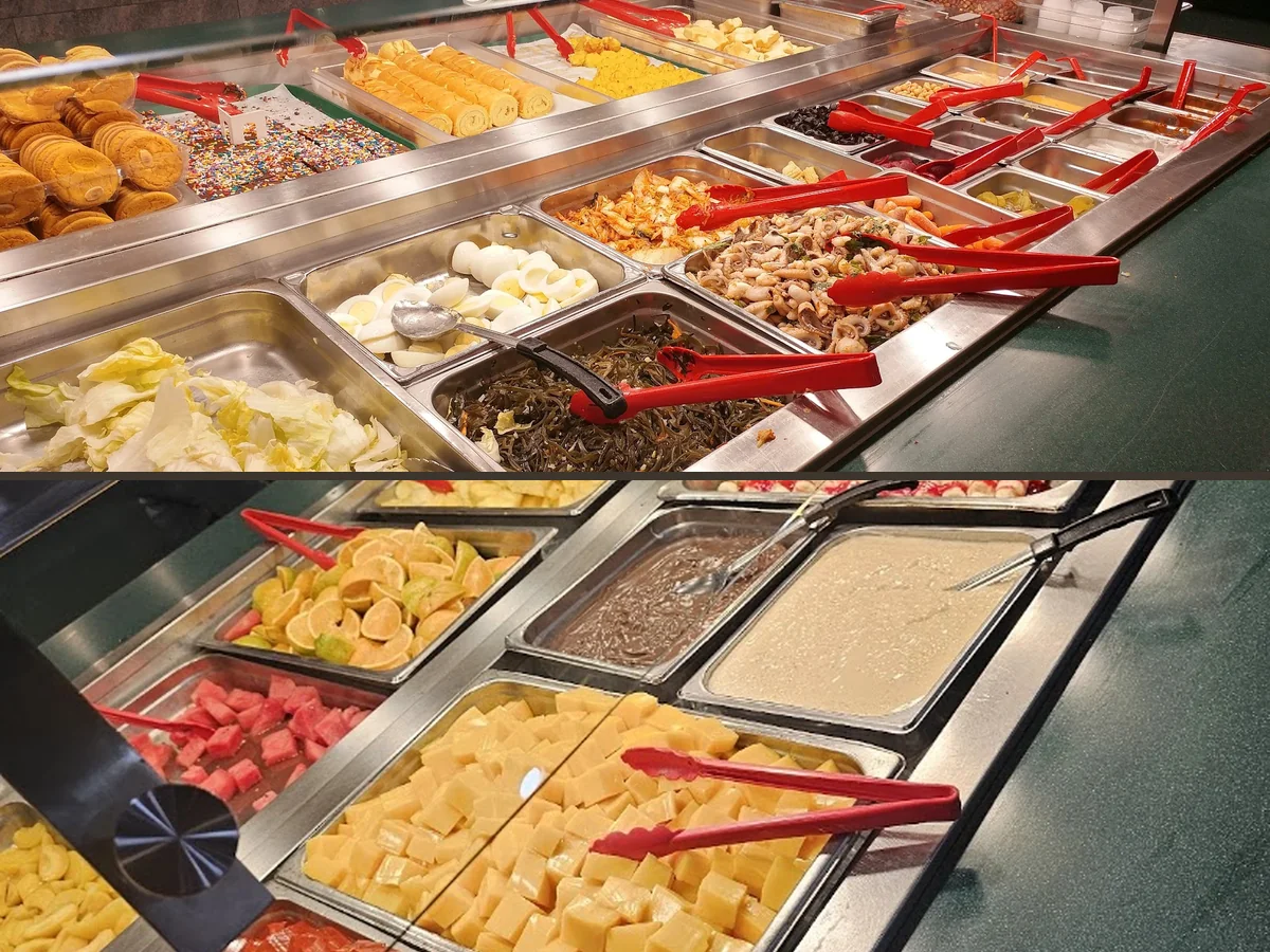 Buffet trays with Chinese and Japanese dishes