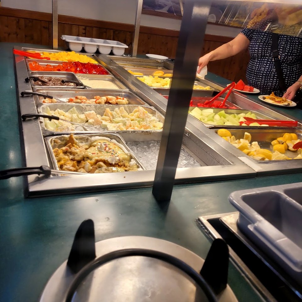 Family seating beside a buffet counter