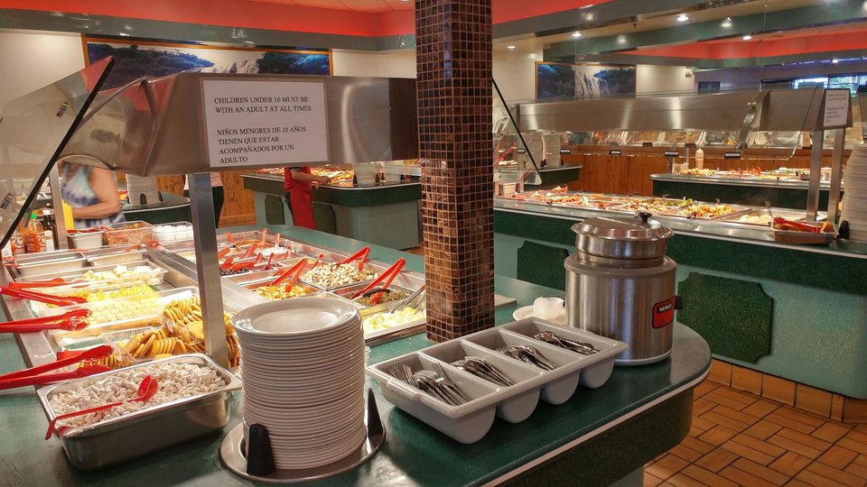 Buffet trays with Chinese and Japanese dishes